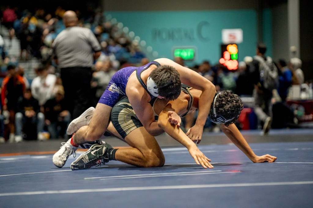 BAKER/POWDER VALLEY BOYS, GIRLS WRESTLING: Bulldog boys competing at Oregon Classic, girls at Battle of the Blues